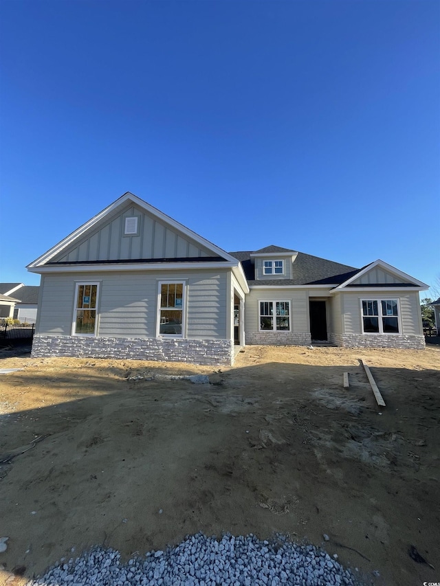 view of front facade with board and batten siding