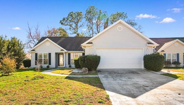 ranch-style house featuring a garage and a front yard