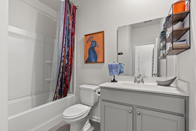 bathroom featuring shower / bath combo, baseboards, visible vents, toilet, and vanity