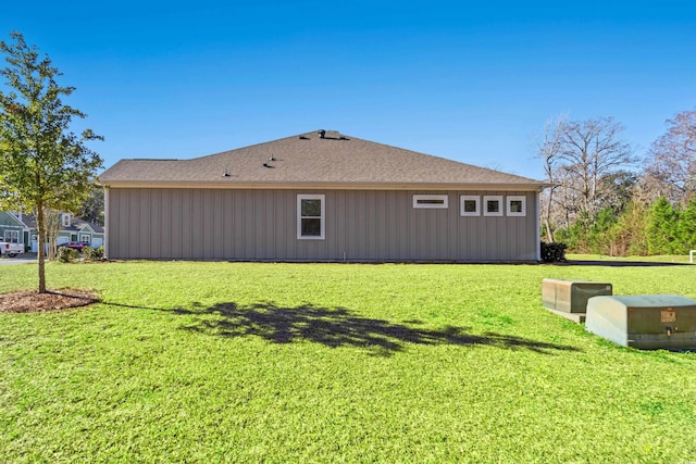 view of home's exterior featuring a yard