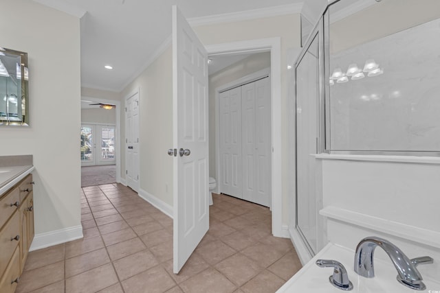 bathroom with vanity, ceiling fan, toilet, french doors, and ornamental molding