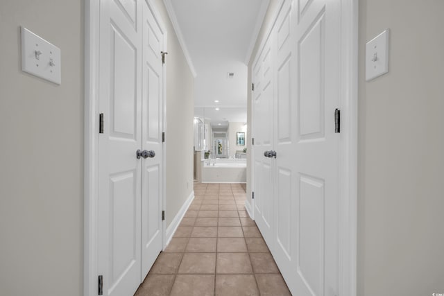 hallway with light tile patterned flooring