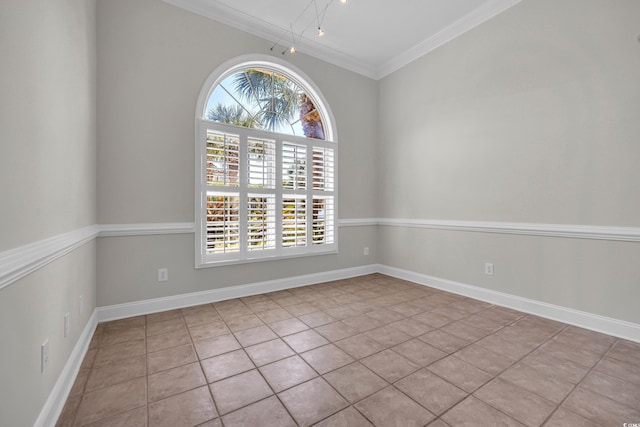 unfurnished room with ornamental molding