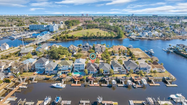 birds eye view of property featuring a water view