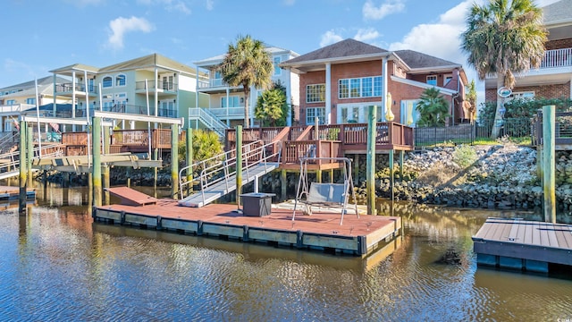 dock area with a water view