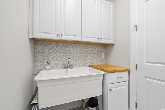 laundry area featuring sink