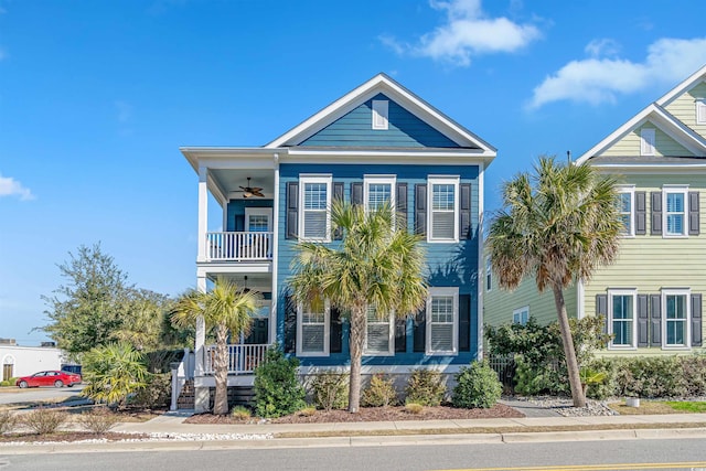 coastal inspired home featuring ceiling fan