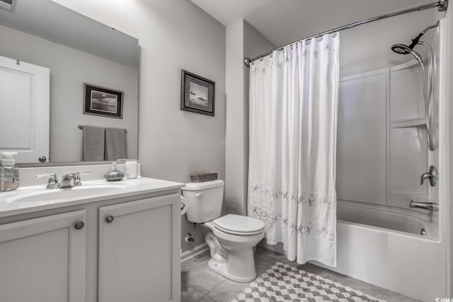 full bathroom featuring vanity, tile patterned flooring, shower / bath combo with shower curtain, and toilet