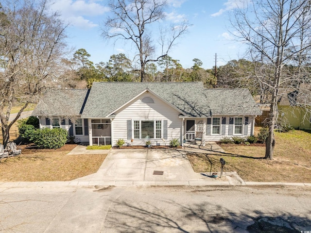 ranch-style house with a front yard