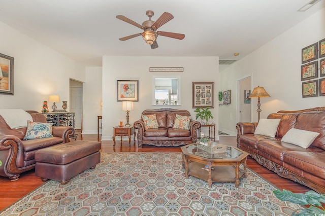 17 Racquet Club Dr, Pawleys Island, SC 29585 - living room with a ceiling fan and wood finished floors