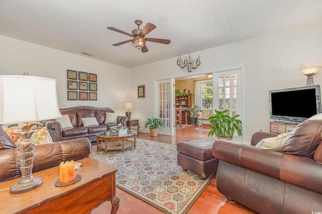 17 Racquet Club Dr, Pawleys Island, SC 29585 - living area featuring ceiling fan and wood finished floors