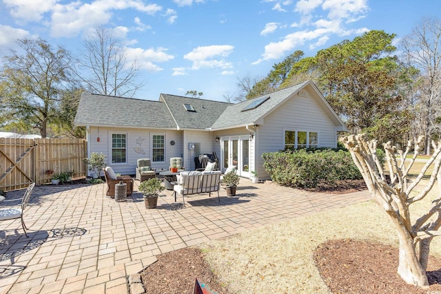 17 Racquet Club Dr, Pawleys Island, SC 29585 - back of house featuring french doors, a patio area, a shingled roof, and outdoor lounge area