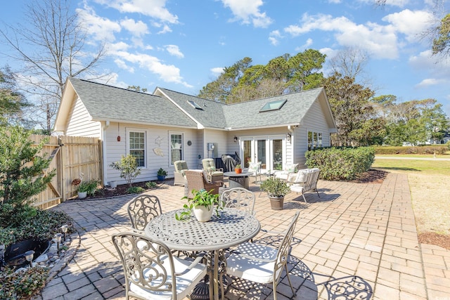 17 Racquet Club Dr, Pawleys Island, SC 29585 - rear view of house with a patio area, french doors, roof with shingles, and an outdoor living space