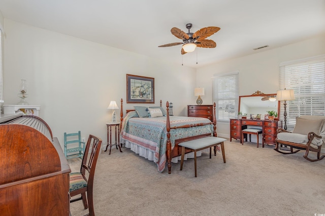 17 Racquet Club Dr, Pawleys Island, SC 29585 - bedroom featuring light colored carpet and a ceiling fan