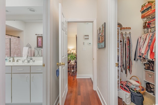 17 Racquet Club Dr, Pawleys Island, SC 29585 - hall with wood finished floors and a sink