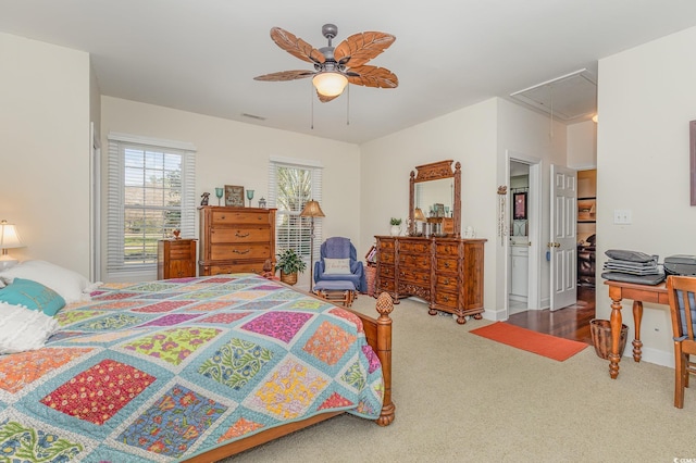 17 Racquet Club Dr, Pawleys Island, SC 29585 - carpeted bedroom featuring attic access, ceiling fan, and ensuite bathroom