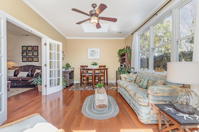 17 Racquet Club Dr, Pawleys Island, SC 29585 - living area featuring wood finished floors, ceiling fan, ornamental molding, baseboards, and french doors
