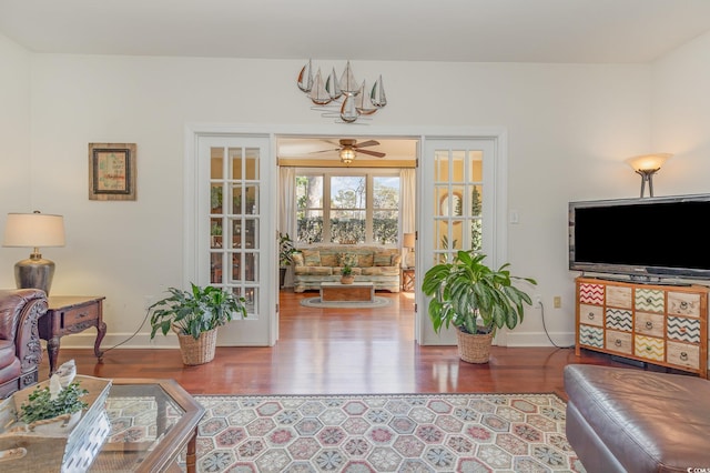 17 Racquet Club Dr, Pawleys Island, SC 29585 - living area featuring wood finished floors, baseboards, and a ceiling fan