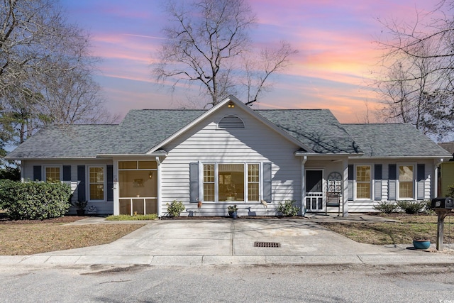 17 Racquet Club Dr, Pawleys Island, SC 29585 - view of front facade featuring roof with shingles