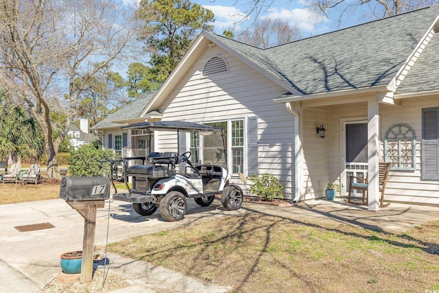17 Racquet Club Dr, Pawleys Island, SC 29585 - view of property exterior with a shingled roof