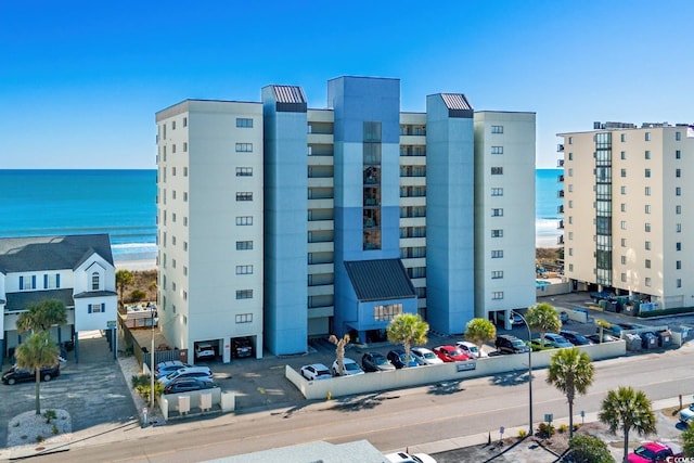 view of building exterior featuring a water view