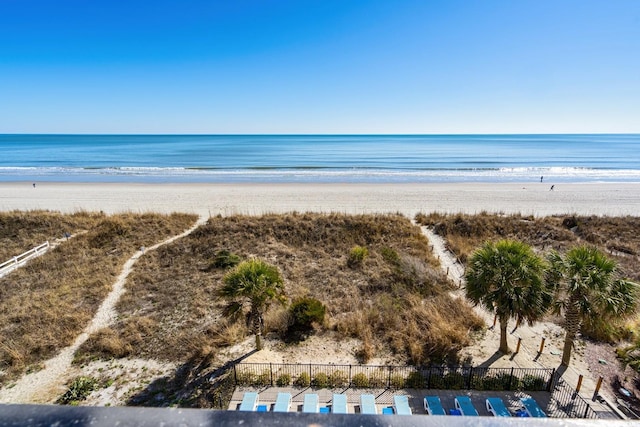 property view of water featuring a beach view