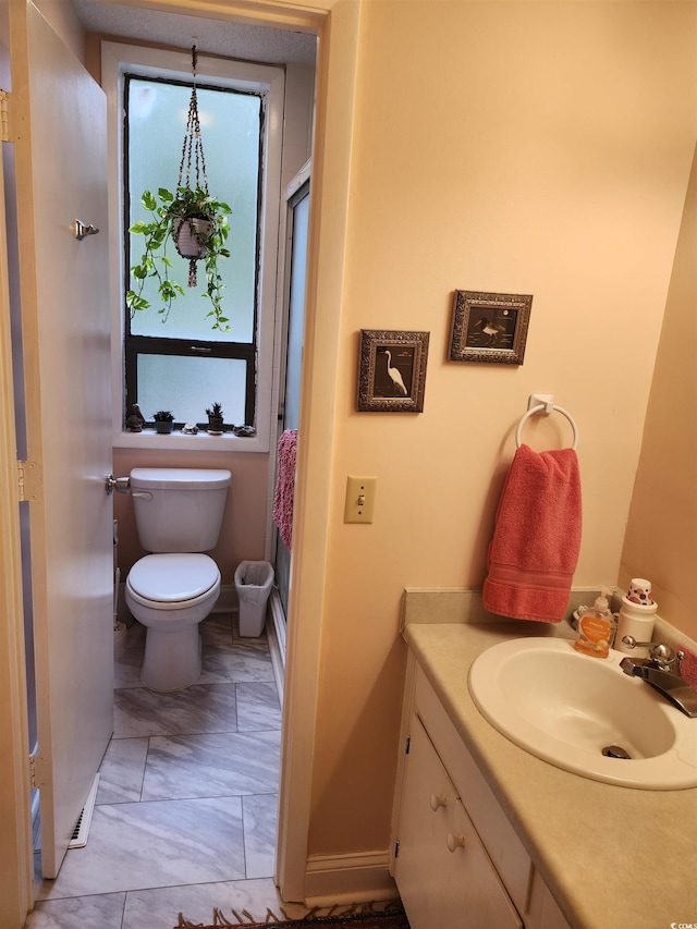 219 Salt Marsh Cir Unit 14A, Pawleys Island, SC 29585 - bathroom with toilet and vanity