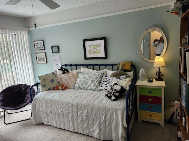 219 Salt Marsh Cir Unit 14A, Pawleys Island, SC 29585 - bedroom featuring carpet flooring, a textured ceiling, and a ceiling fan
