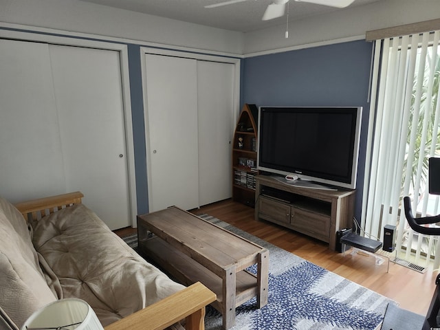219 Salt Marsh Cir Unit 14A, Pawleys Island, SC 29585 - living room with wood finished floors and a ceiling fan