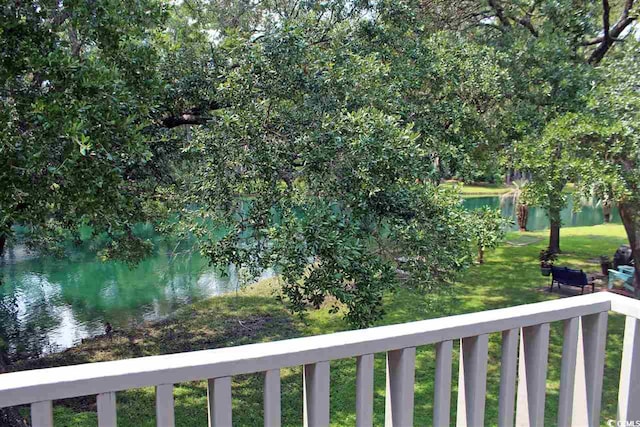 219 Salt Marsh Cir Unit 14A, Pawleys Island, SC 29585 - view of grassy yard with a water view and a balcony
