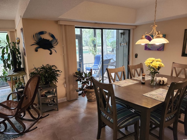 219 Salt Marsh Cir Unit 14A, Pawleys Island, SC 29585 - tiled dining space featuring baseboards