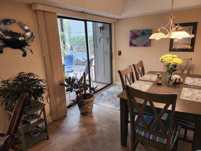 219 Salt Marsh Cir Unit 14A, Pawleys Island, SC 29585 - tiled dining space with a chandelier