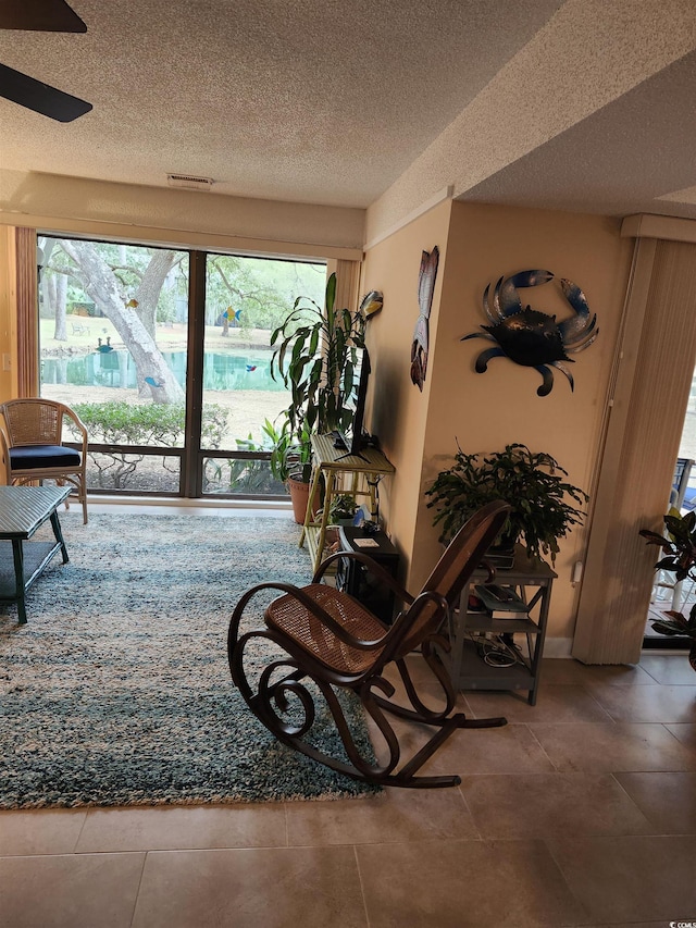 219 Salt Marsh Cir Unit 14A, Pawleys Island, SC 29585 - interior space with a textured ceiling and tile patterned floors