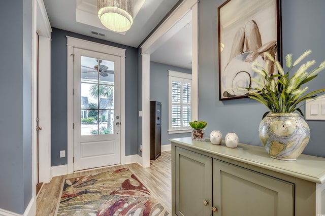 foyer entrance with light hardwood / wood-style flooring