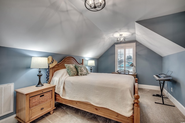 bedroom with carpet floors and lofted ceiling