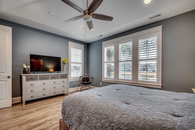 bedroom featuring ceiling fan and light hardwood / wood-style floors