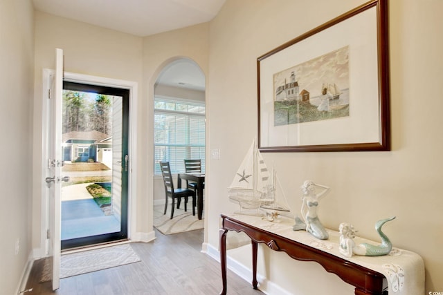 entryway with light hardwood / wood-style flooring