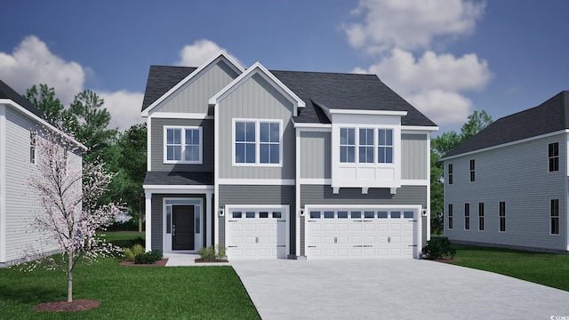 view of front of home featuring a garage and a front yard