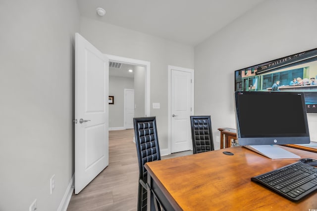 office space featuring light hardwood / wood-style flooring