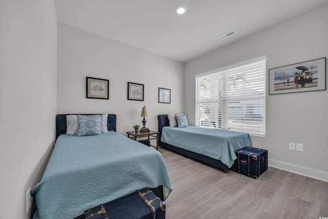 bedroom featuring light wood-type flooring