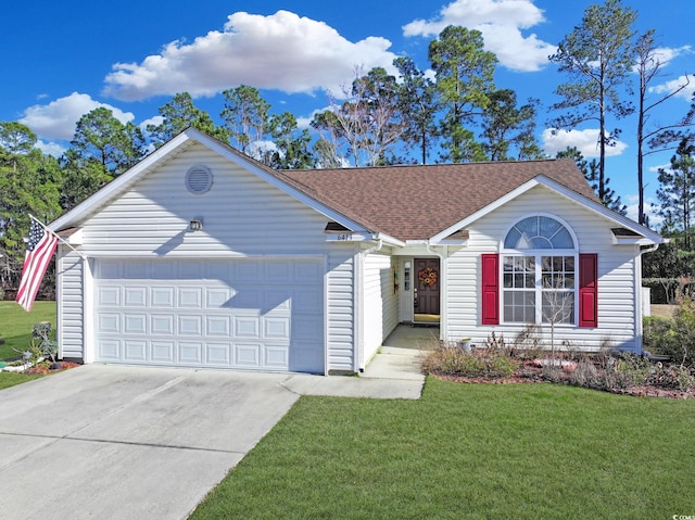 ranch-style home featuring a front lawn and a garage