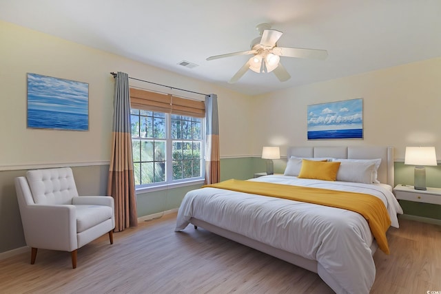 bedroom featuring light wood-type flooring and ceiling fan