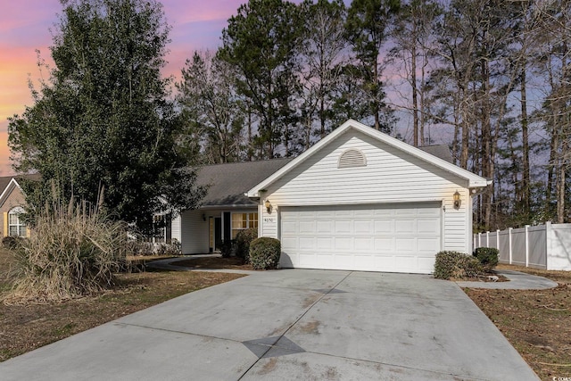 ranch-style home with a garage