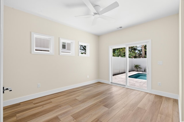 713 9th Ave S, North Myrtle Beach, SC 29582 - unfurnished room featuring light wood finished floors and ceiling fan