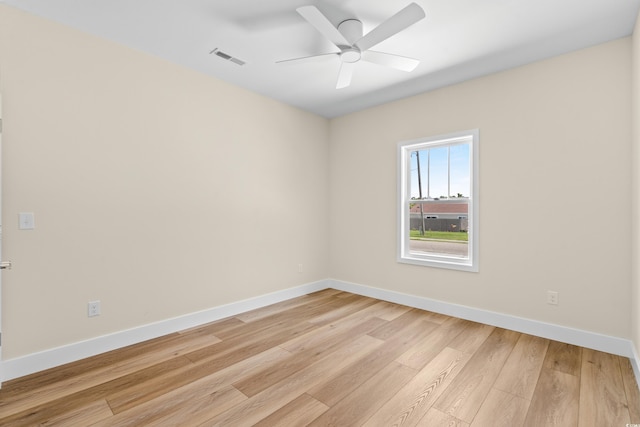 713 9th Ave S, North Myrtle Beach, SC 29582 - spare room with light wood finished floors and ceiling fan