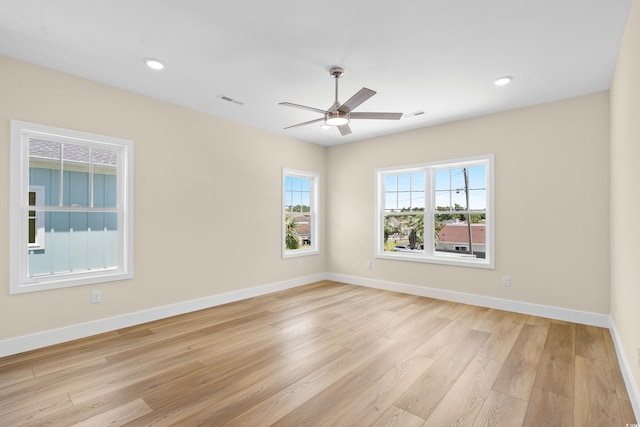 713 9th Ave S, North Myrtle Beach, SC 29582 - unfurnished room featuring light wood-style flooring, ceiling fan, and recessed lighting