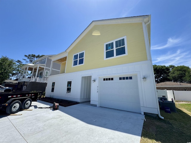 view of front of home featuring a garage and driveway