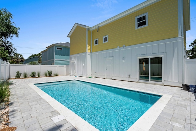 713 9th Ave S, North Myrtle Beach, SC 29582 - view of swimming pool with a patio and a fenced backyard