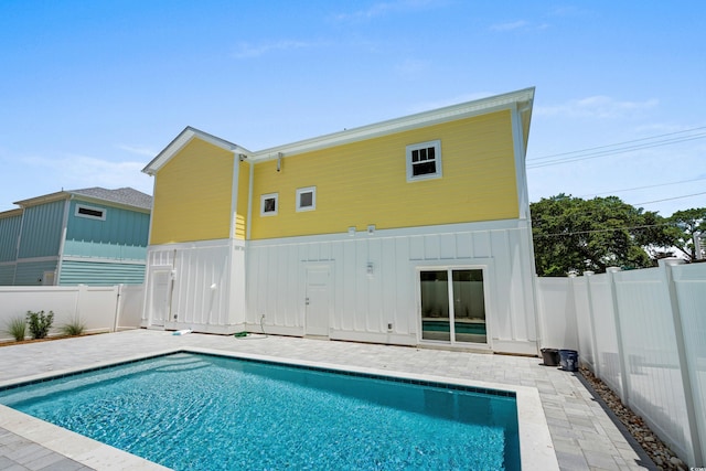 713 9th Ave S, North Myrtle Beach, SC 29582 - view of pool with a patio and a fenced backyard