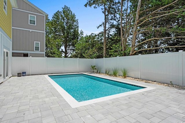 713 9th Ave S, North Myrtle Beach, SC 29582 - view of pool featuring a patio area and a fenced backyard